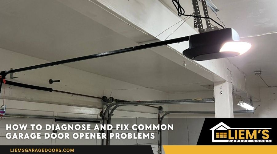 A black garage door opener motor with an active light mounted on a garage ceiling.